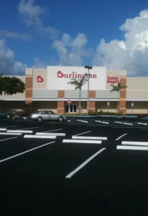 Freshly paved and line striped store parking lot