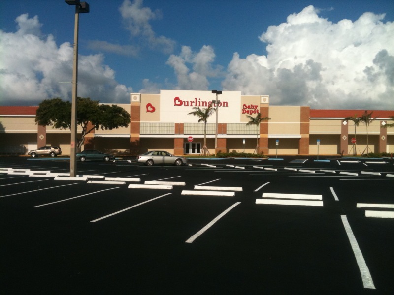 Freshly paved and line striped store parking lot